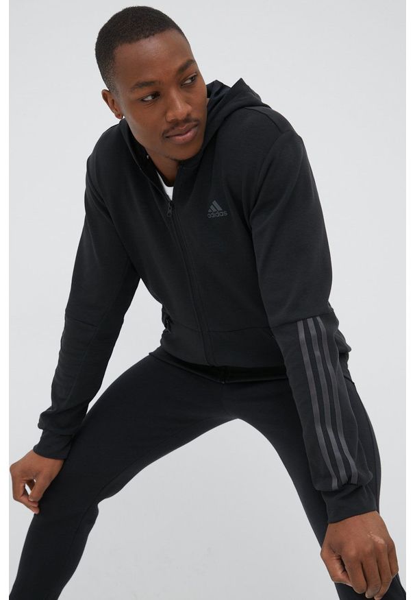 Adidas - adidas bluza treningowa Motion HC0639 męska kolor czarny z kapturem z aplikacją. Typ kołnierza: kaptur. Kolor: czarny. Materiał: skóra, dzianina, materiał. Wzór: aplikacja