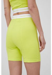 Calvin Klein Jeans szorty J20J218045.PPYY damskie kolor żółty gładkie high waist. Stan: podwyższony. Kolor: żółty. Materiał: materiał, wiskoza, dzianina. Wzór: gładki #2