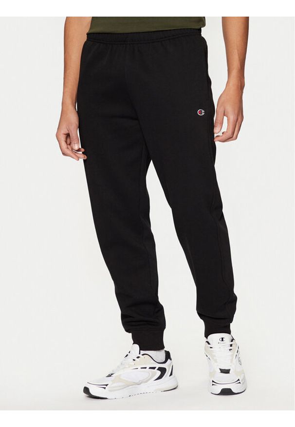 Champion Spodnie dresowe 220299 Czarny Slim Fit. Kolor: czarny. Materiał: syntetyk, bawełna
