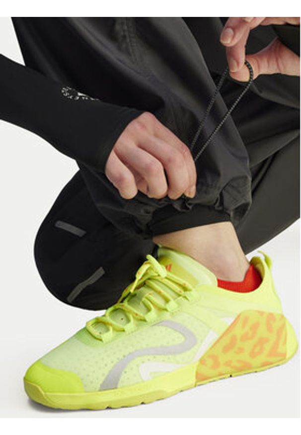 Adidas by Stella McCartney - adidas by Stella McCartney Spodnie dresowe Woven JI5248 Czarny Loose Fit. Kolor: czarny. Materiał: syntetyk