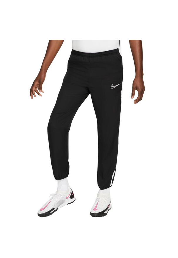 Spodnie Sportowe męskie Nike NK Dry Academy Pant. Kolor: czarny. Materiał: dresówka. Technologia: Dri-Fit (Nike). Sport: piłka nożna