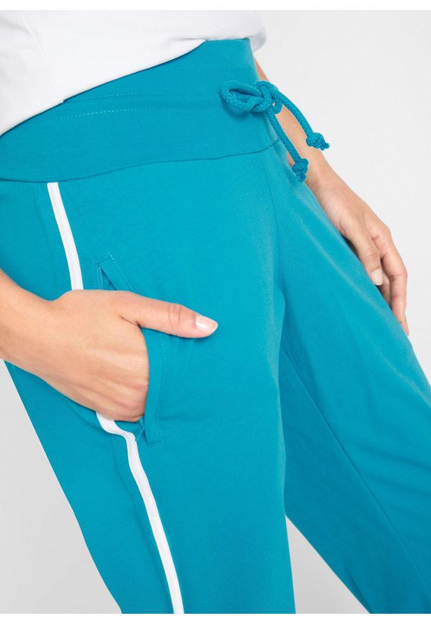 bonprix - Spodnie 3/4 do biegania z bawełny (2 pary). Kolor: niebieski. Materiał: bawełna. Styl: sportowy