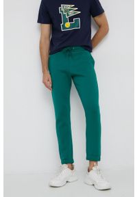United Colors of Benetton Spodnie męskie kolor zielony gładkie. Kolor: zielony. Wzór: gładki