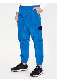 Calvin Klein Jeans Spodnie dresowe J30J322924 Granatowy Relaxed Fit. Kolor: niebieski. Materiał: syntetyk, dresówka
