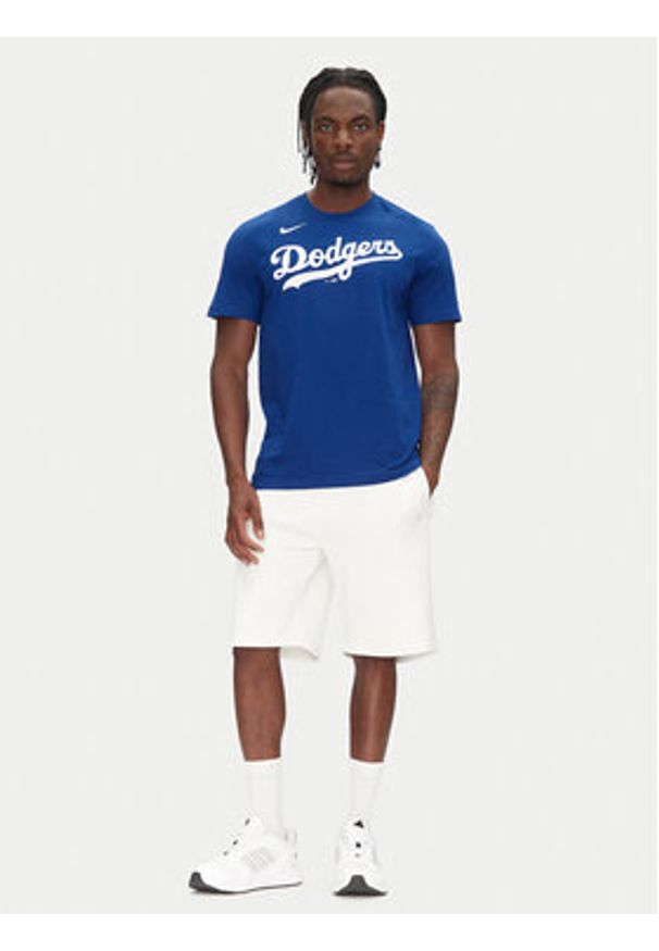 Nike T-Shirt N199-4EW-LD-0U5 Niebieski Regular Fit. Kolor: niebieski. Materiał: bawełna