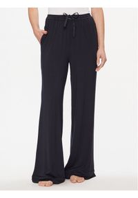 TOMMY HILFIGER - Tommy Hilfiger Spodnie dresowe UW0UW05195 Granatowy Relaxed Fit. Kolor: niebieski. Materiał: dresówka #1