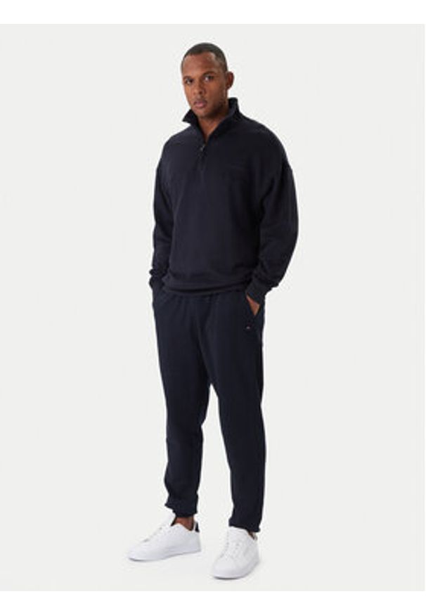 TOMMY HILFIGER - Tommy Hilfiger Spodnie dresowe Terry MW0MW37236 Granatowy Regular Fit. Kolor: niebieski. Materiał: bawełna