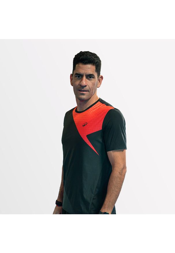 KUIKMA - Koszulka do padla z krótkim rękawem męska Kuikma PTS Pro Maxi Sanchez. Kolor: wielokolorowy, pomarańczowy, różowy, czarny. Materiał: materiał, poliester, elastan. Długość rękawa: krótki rękaw. Długość: krótkie