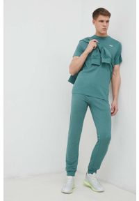 Fila spodnie dresowe kolor zielony gładkie. Kolor: zielony. Materiał: dresówka. Wzór: gładki #3