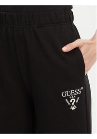 Guess Spodnie dresowe V5RB12 KC3D2 Czarny Regular Fit. Kolor: czarny. Materiał: syntetyk #3