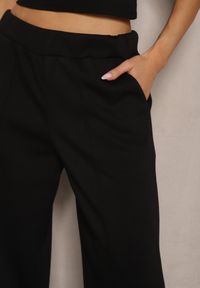 Renee - Czarne Spodnie z Wiskozą o Szerokim Kroju Ozdobione Kantem Belhira. Okazja: na co dzień, na spotkanie biznesowe. Kolor: czarny. Materiał: wiskoza. Wzór: aplikacja. Styl: biznesowy, casual, elegancki #3