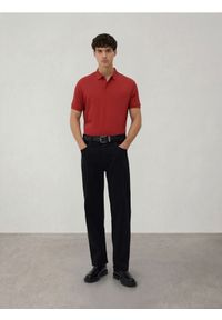 Reserved - Koszulka polo regular z domieszką jedwabiu - pomarańczowy. Typ kołnierza: polo. Kolor: pomarańczowy. Materiał: jedwab #1
