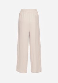 Renee - Beżowe Szerokie Spodnie z Wiskozą z Gumką w Pasie Lealirre. Okazja: na co dzień. Kolor: beżowy. Materiał: wiskoza. Wzór: gładki. Styl: casual #4