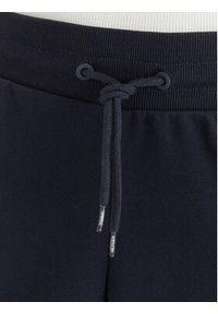TOMMY HILFIGER - Tommy Hilfiger Spodnie dresowe UW0UW04522 Granatowy Regular Fit. Kolor: niebieski. Materiał: syntetyk, bawełna #4