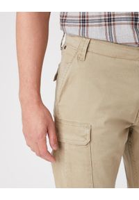 Wrangler - SPODNIE MĘSKIE WRANGLER CASEY CARGO SADDLE W1C250327 112127691. Okazja: na co dzień. Długość: długie. Styl: sportowy, klasyczny, elegancki, casual