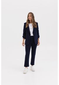 SPODNIE NANCY GRANATOWE S - Flawless. Okazja: na spotkanie biznesowe. Kolor: niebieski. Materiał: skóra, guma. Styl: elegancki, sportowy, biznesowy, klasyczny #1