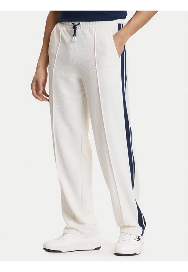 Guess Spodnie dresowe Z6GB14 K3211 Écru Regular Fit. Materiał: syntetyk