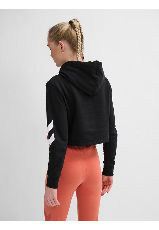 Damska bluza z kapturem Hummel hmlLEGACY cropped. Typ kołnierza: kaptur. Kolor: czarny. Materiał: bawełna, tkanina, materiał. Wzór: nadruk. Sport: fitness