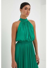 Morgan sukienka kolor zielony maxi rozkloszowana. Typ kołnierza: dekolt halter. Kolor: zielony. Materiał: tkanina. Typ sukienki: rozkloszowane. Długość: maxi #2