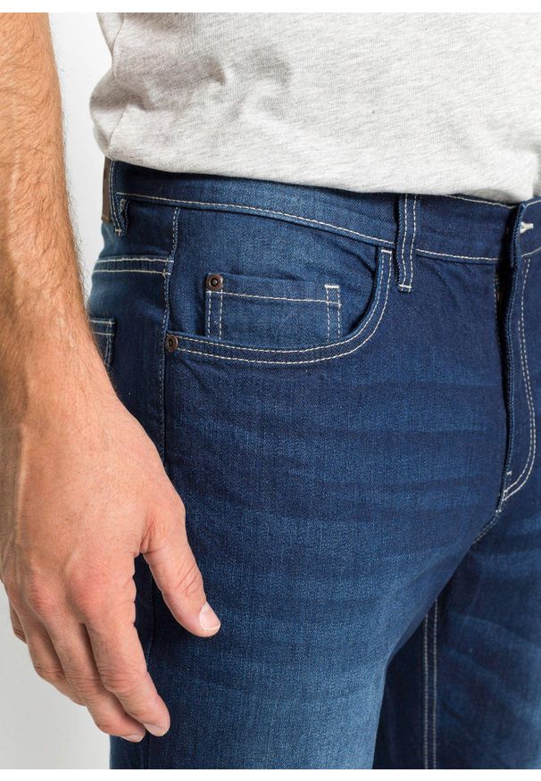 bonprix - Dżinsy ze stretchem, regular fit, o kroju bootcut. Kolor: niebieski