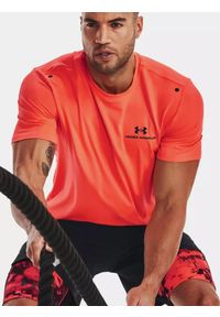 Koszulka fitness męska Under Armour UA Rush Energy. Kolor: pomarańczowy. Długość rękawa: krótki rękaw. Długość: krótkie. Sport: fitness