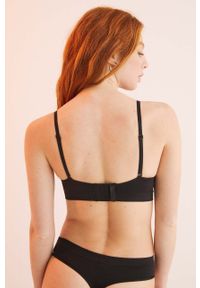 Women Secret - women'secret biustonosz SEAMLESS 3 kolor czarny gładki 5105022. Kolor: czarny. Wzór: gładki #6