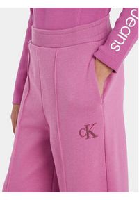 Calvin Klein Jeans Spodnie dresowe IG0IG02174 Różowy Relaxed Fit. Kolor: różowy. Materiał: bawełna