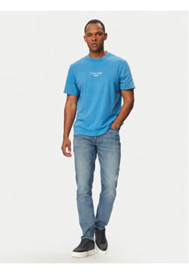 Calvin Klein Jeans Jeansy LV04RF742G Niebieski Tapered Fit. Kolor: niebieski