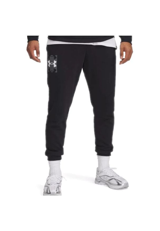 Spodnie dresowe męskie Under Armour. Kolor: czarny. Materiał: dresówka. Długość: długie