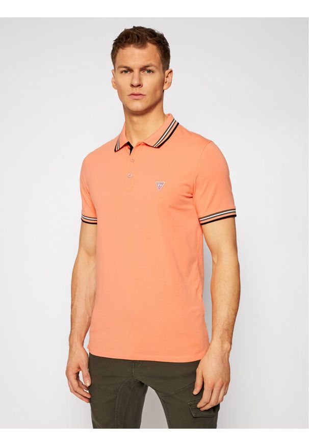 Polo Guess. Typ kołnierza: polo. Kolor: pomarańczowy