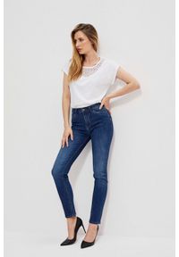 MOODO - Proste jeansy z przetarciami. Długość: długie. Wzór: gładki