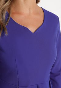 Born2be - Fioletowa Rozkloszowana Sukienka z Rękawem 3/4 Nomiel. Okazja: na spotkanie biznesowe. Typ kołnierza: dekolt w kształcie V. Kolor: fioletowy. Typ sukienki: rozkloszowane. Styl: klasyczny, elegancki, biznesowy #5