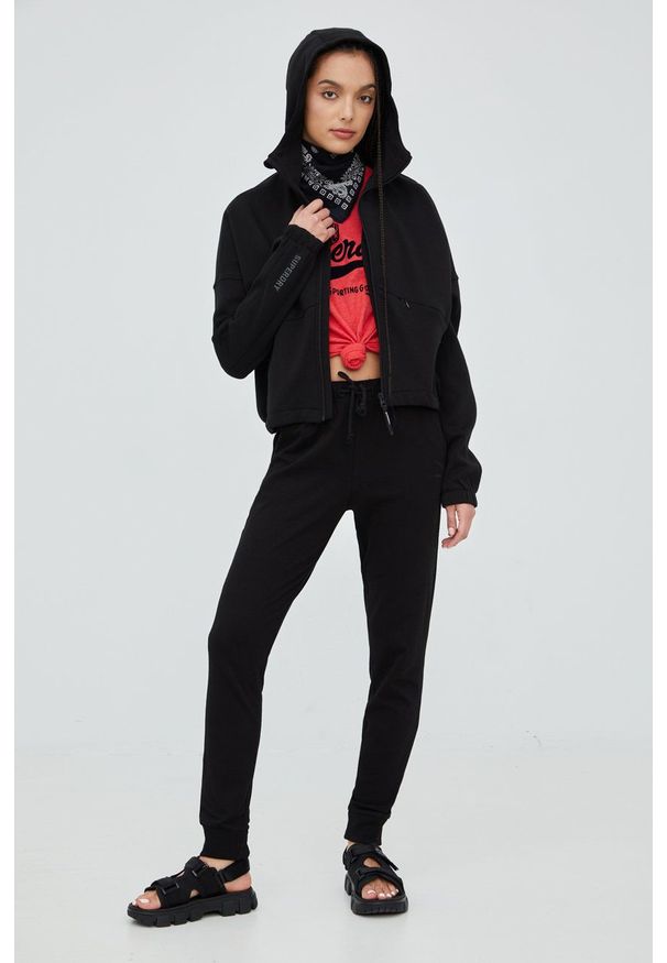 Superdry bluza damska kolor czarny z kapturem gładka. Typ kołnierza: kaptur. Kolor: czarny. Wzór: gładki