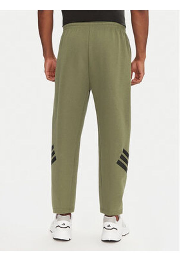 Adidas - adidas Spodnie dresowe Future Icons 3-Stripes JD4891 Zielony Loose Fit. Kolor: zielony. Materiał: bawełna, syntetyk
