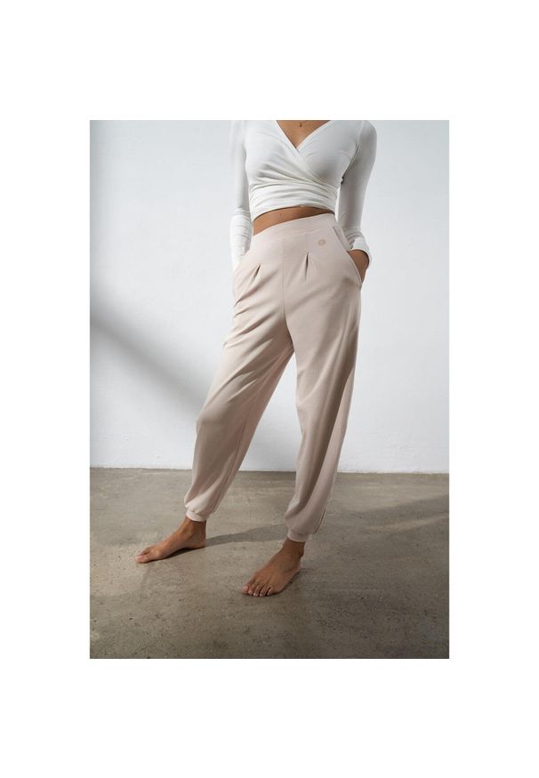 MOONHOLI - Spodnie do jogi Moonholi Moony Comfy Sweatpants z kieszeniami. Kolor: beżowy. Sport: joga i pilates