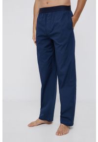 Resteröds Spodnie piżamowe męskie kolor granatowy gładkie. Kolor: niebieski. Materiał: tkanina. Wzór: gładki