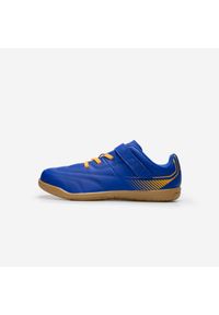 KIPSTA - Buty do piłki nożnej halowej dla dzieci Kipsta Futsal 100. Zapięcie: rzepy. Kolor: pomarańczowy, niebieski, wielokolorowy, beżowy. Materiał: poliester. Sport: piłka nożna