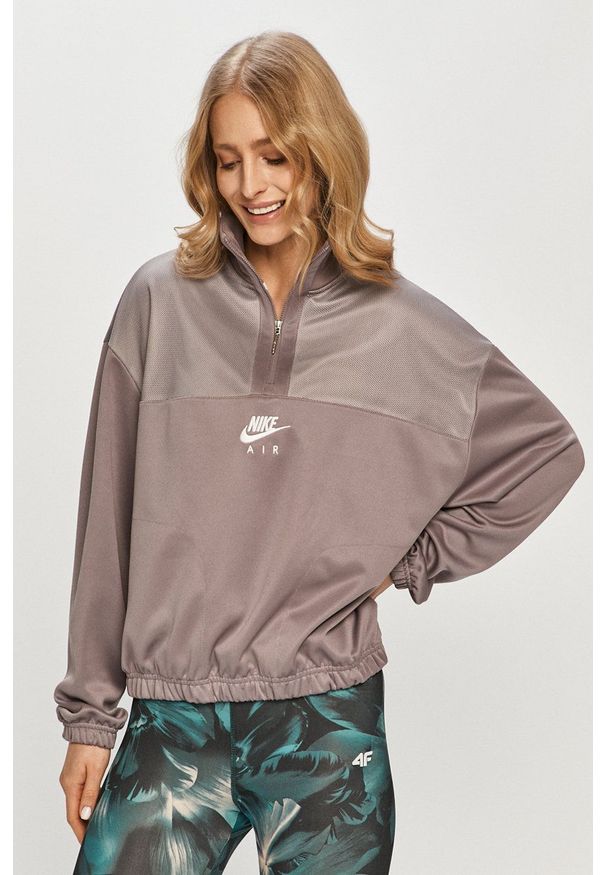 Nike Sportswear - Bluza. Okazja: na co dzień. Kolor: fioletowy. Długość rękawa: długi rękaw. Długość: długie. Wzór: nadruk. Styl: casual