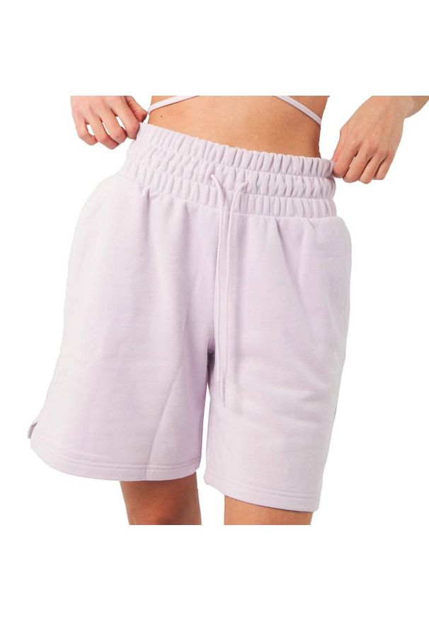 Spodnie Kobieta Puma Classics High Waist Longline 8´´ biały. Stan: podwyższony. Kolor: fioletowy. Sport: bieganie, fitness