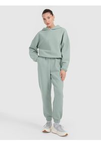 4f - 4F Spodnie dresowe z waflowej dzianiny damskie - turkusowe XS. Stan: podwyższony. Kolor: turkusowy. Materiał: dzianina, dresówka #1