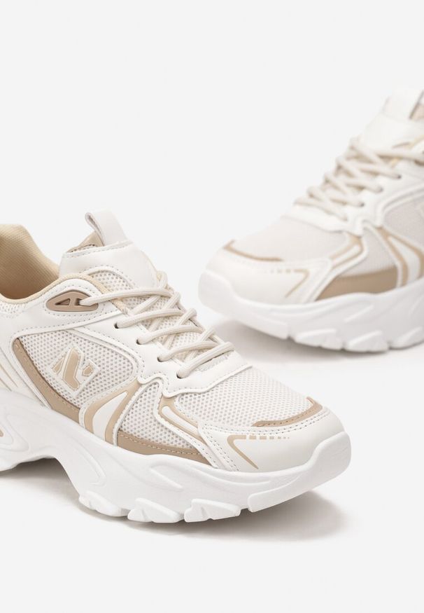 Renee - Beżowe Sznurowane Sneakersy z Siateczką i Wycięciami Solenare. Kolor: beżowy