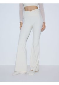 Reserved - Spodnie flare - złamana biel. Materiał: dzianina #1
