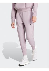 Adidas - adidas Spodnie dresowe Z.N.E. IS3913 Fioletowy Regular Fit. Kolor: fioletowy. Materiał: bawełna