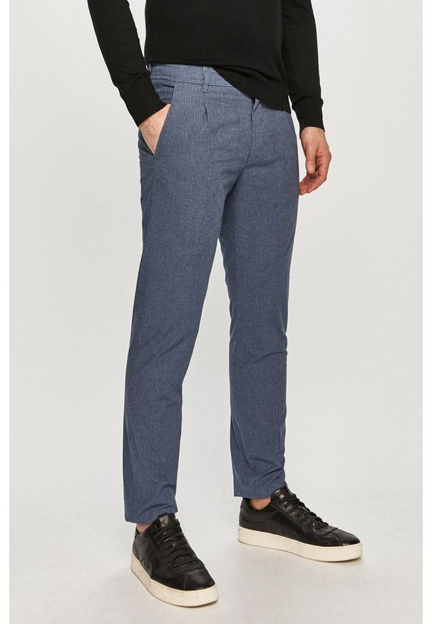 TOMMY HILFIGER - Tommy Hilfiger - Spodnie. Okazja: na co dzień. Kolor: niebieski. Materiał: tkanina. Styl: casual