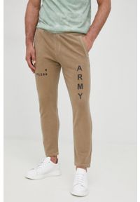 MANUEL RITZ - Manuel Ritz spodnie dresowe męskie kolor beżowy z nadrukiem. Kolor: beżowy. Materiał: dresówka. Wzór: nadruk