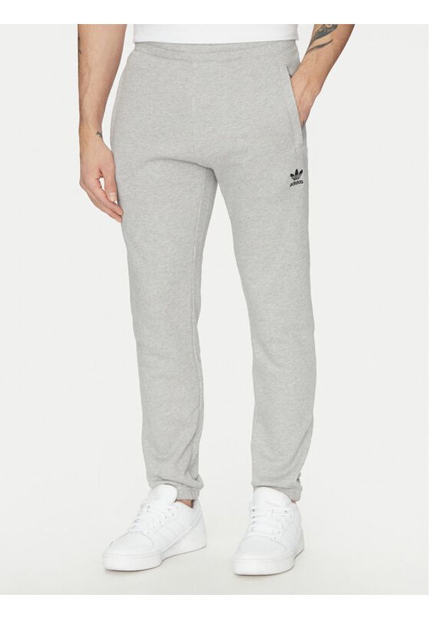 Adidas - adidas Spodnie dresowe Trefoil Essentials JD2424 Szary Slim Fit. Kolor: szary. Materiał: bawełna