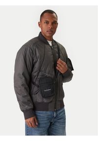 Calvin Klein Saszetka Bold Logo Nylon Slim Reporter LV04D3231G Czarny. Kolor: czarny. Materiał: materiał #1