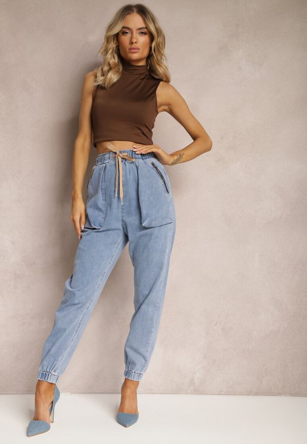 Renee - Niebieskie Jeansy Joggery Zapinane na Suwak ze Ściągaczami i Gumką w Pasie Castania. Okazja: na co dzień. Kolor: niebieski. Styl: elegancki, casual