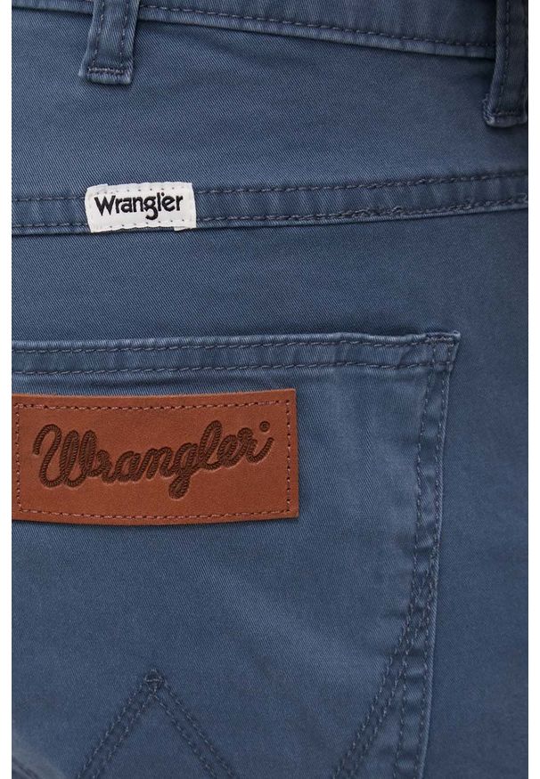 Wrangler spodnie męskie w fasonie chinos. Kolor: niebieski. Materiał: tkanina