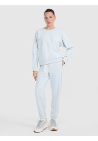 4f - 4F Spodnie dresowe joggery damskie - niebieskie XS. Kolor: niebieski. Materiał: dresówka #1